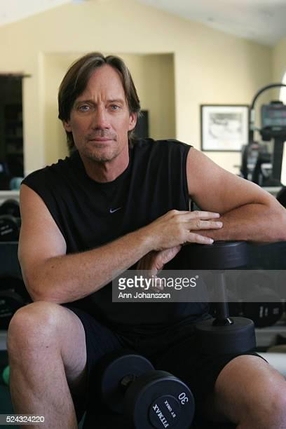 02738037---actor-kevin-sorbo-poses-for-photographs-in-the-gym-of-his-home-in-picture-id524324220?s=612x612.jpg